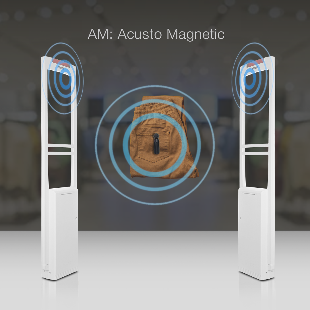 Pencil Tag Black applied to a pair of pants between two panels, with waves emanating from both the tag and the panels, showcasing its acousto-magnetic (AM) technology. Provides effective anti-theft protection for apparel using AM security systems.
