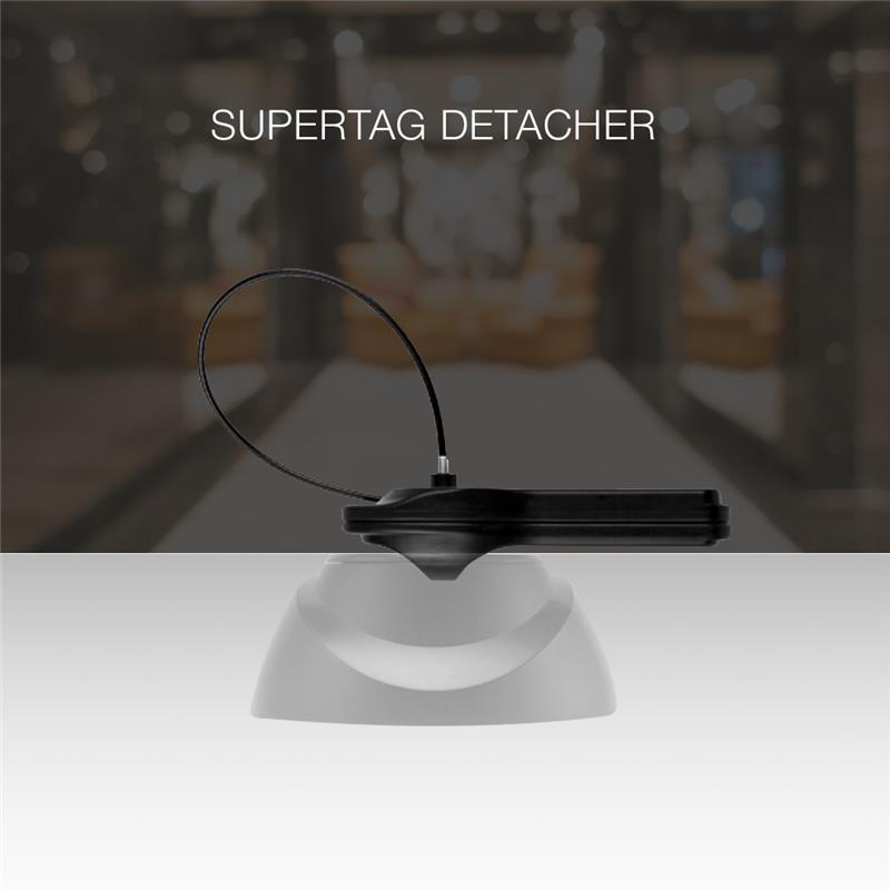 Alarming Supertag 15cm Lanyard being removed with a detacher for secure and easy deactivation after purchase.