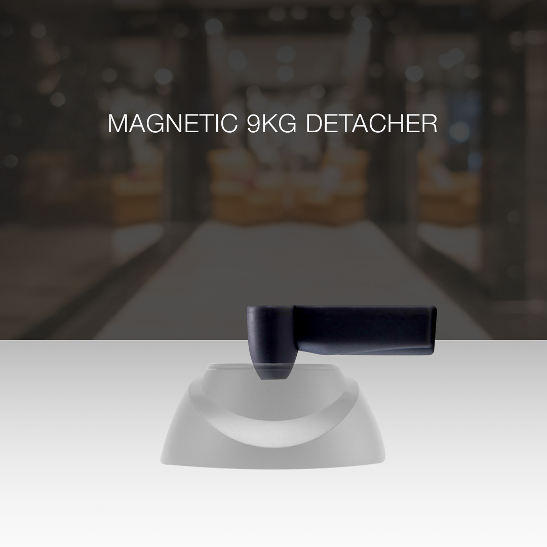 Pencil Tag Black being used with the 9kg Magnetic Detacher. Designed for secure and efficient removal of AM tags, ensuring quick and safe detachment while maintaining anti-theft protection in retail environments.