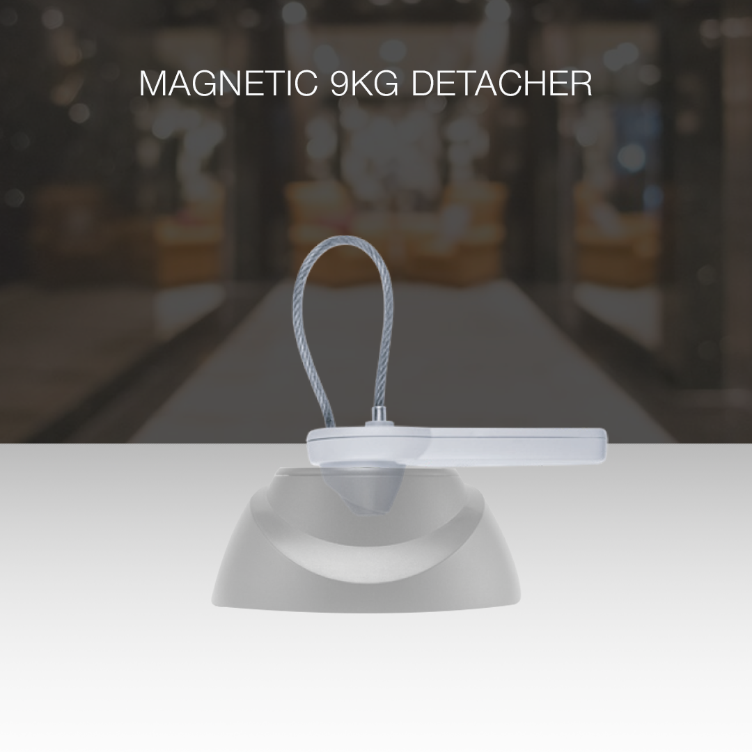 Ultra Tag Lanyard being used with the Magnetic 9kg Detacher. Designed for secure and efficient tag removal, ensuring quick and safe detachment while maintaining strong anti-theft protection in retail environments.