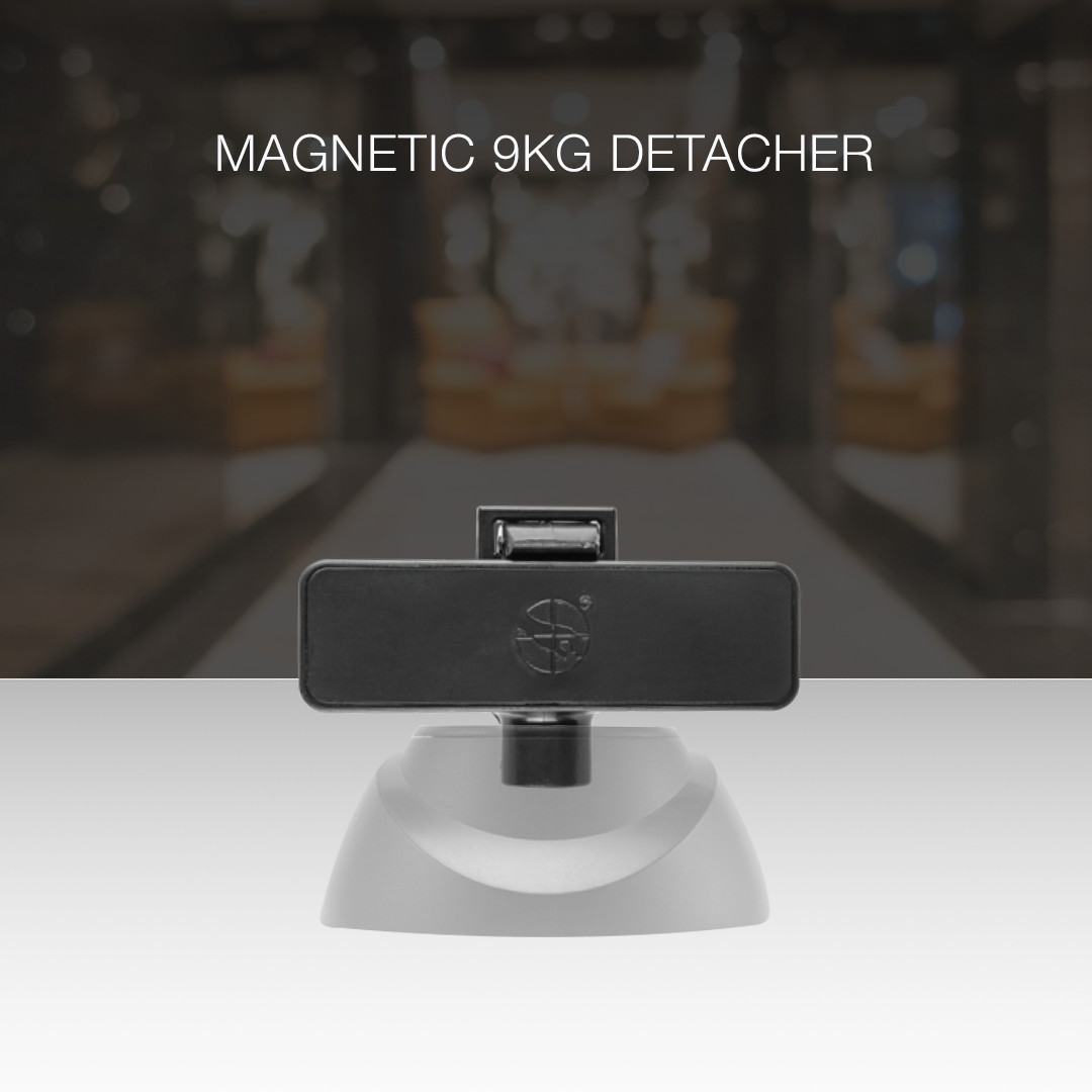 Magnetic Optical Tag being used with the Magnetic 9kg Detacher. Designed for secure and efficient removal of magnetic optical tags, ensuring quick and safe detachment while maintaining anti-theft protection in retail environments.