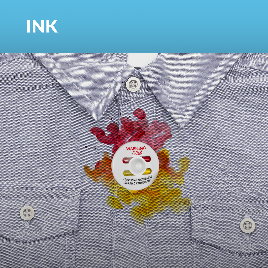 Saucer Ink Security Tag activated, releasing ink onto a shirt as a theft deterrent measure.