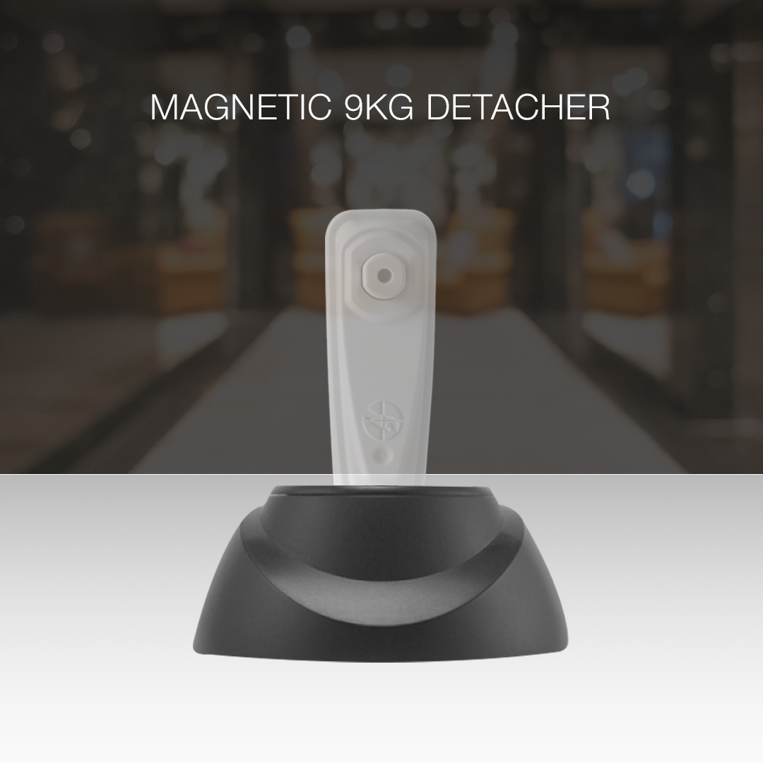 Magnetic Detacher shown with a hard tag. Designed for secure and efficient removal of magnetic anti-theft tags, ensuring quick and safe detachment while maintaining product security in retail environments.
